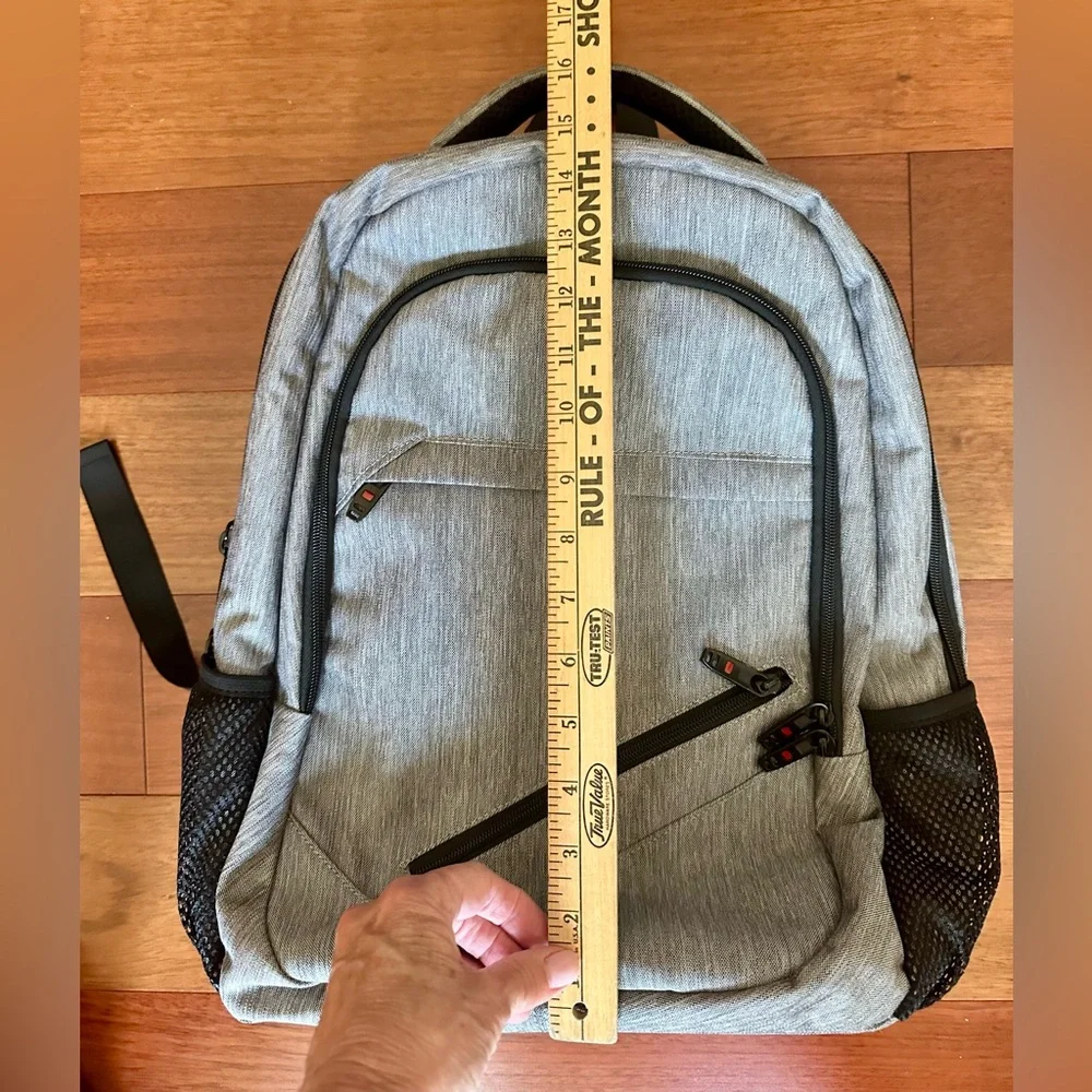 Backpack Excellent condition! Lots of zip compartments. Grey black. Clean!